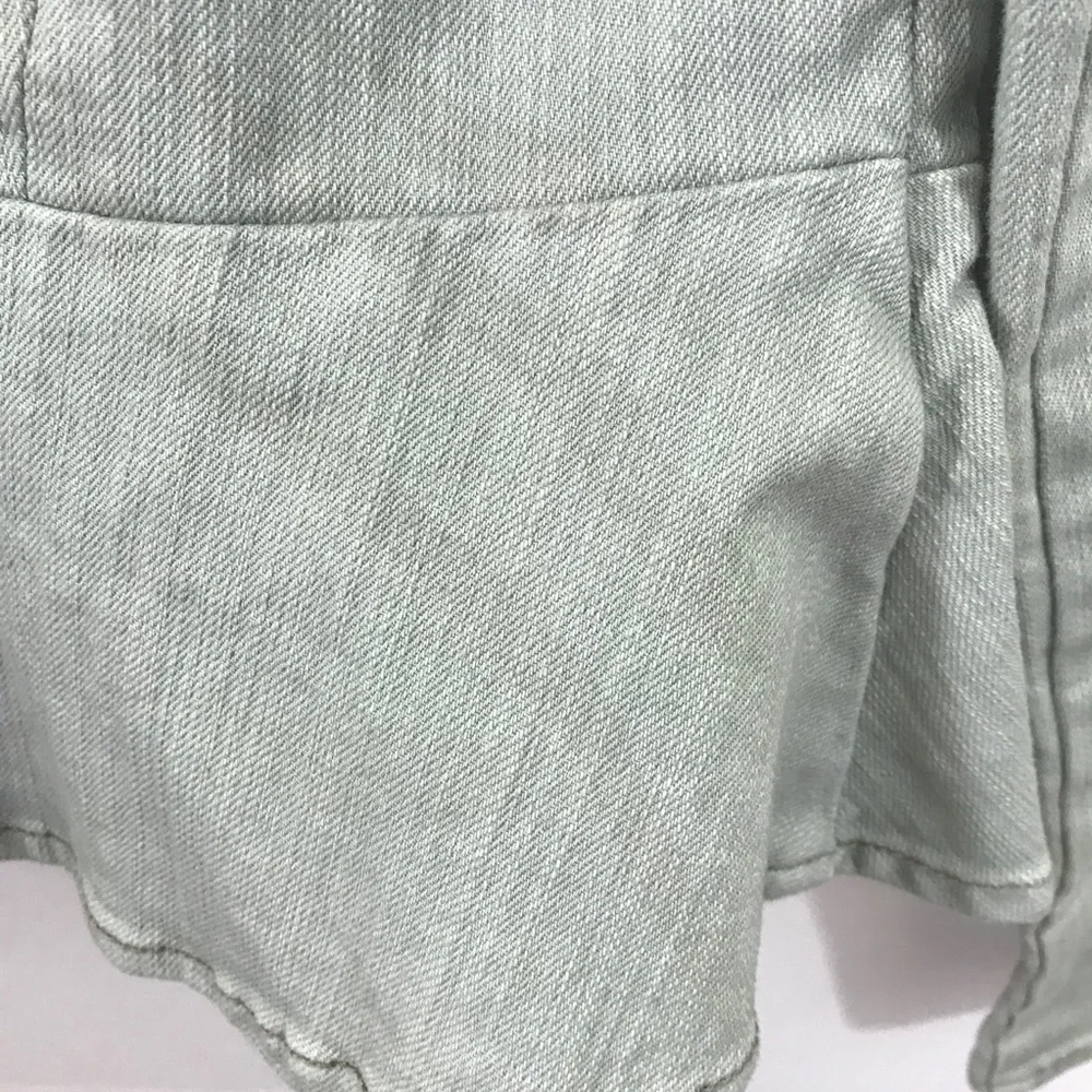 Free People Peplum denim Moto zip jacket.